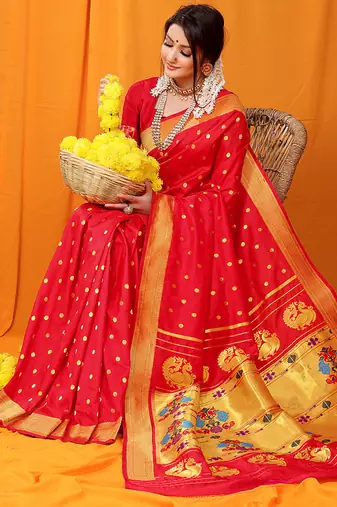 Red paithani silk blend saree with gold zari border & peacock pallu