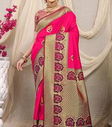 Rani pink banarasi silk blend saree with purple zari border & brocade blouse