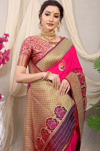 Rani pink banarasi silk blend saree with purple zari border & brocade blouse