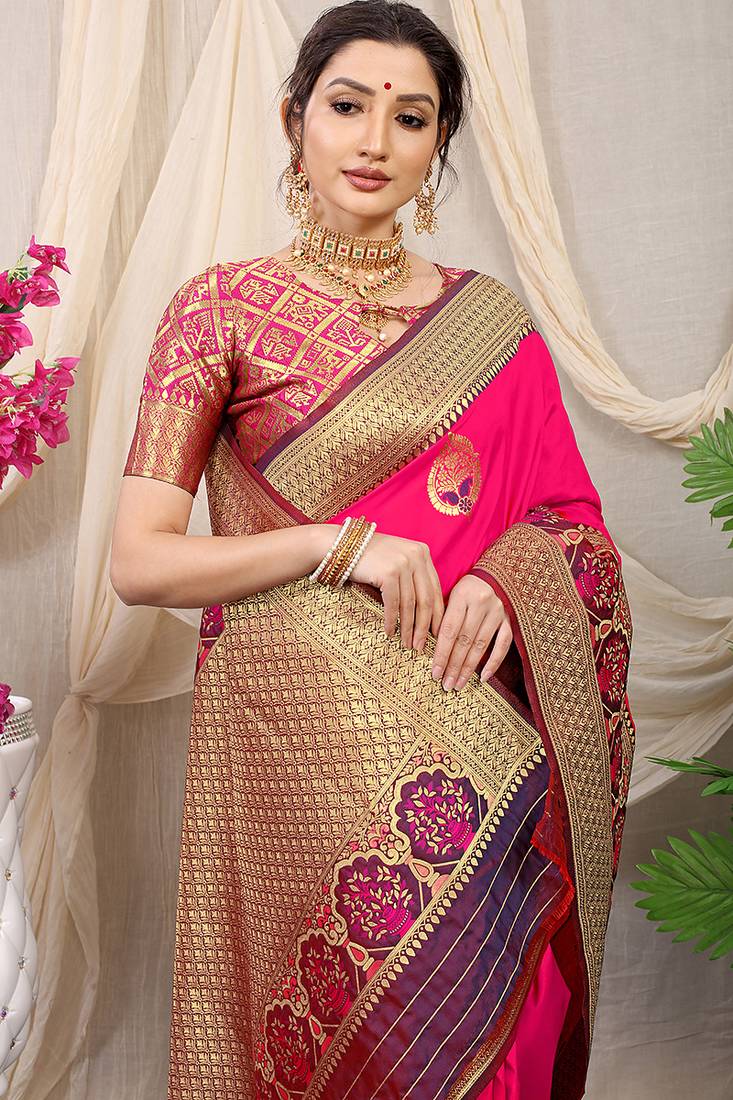 Rani pink banarasi silk blend saree with purple zari border & brocade blouse