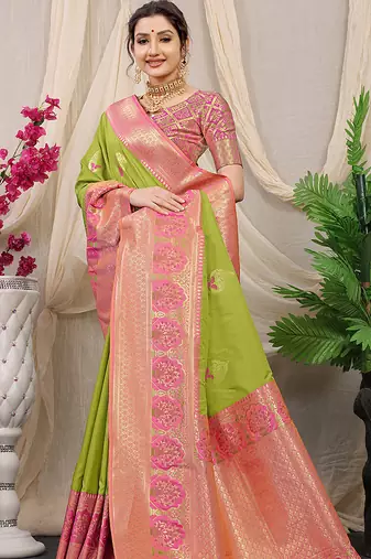 Light green banarasi silk blend saree with pink zari border & brocade blouse