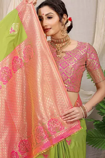 Light green banarasi silk blend saree with pink zari border & brocade blouse