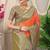 Orange banarasi silk blend saree with olive brown zari border & brocade blouse