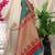 Teal banarasi silk blend saree with red zari border & brocade blouse