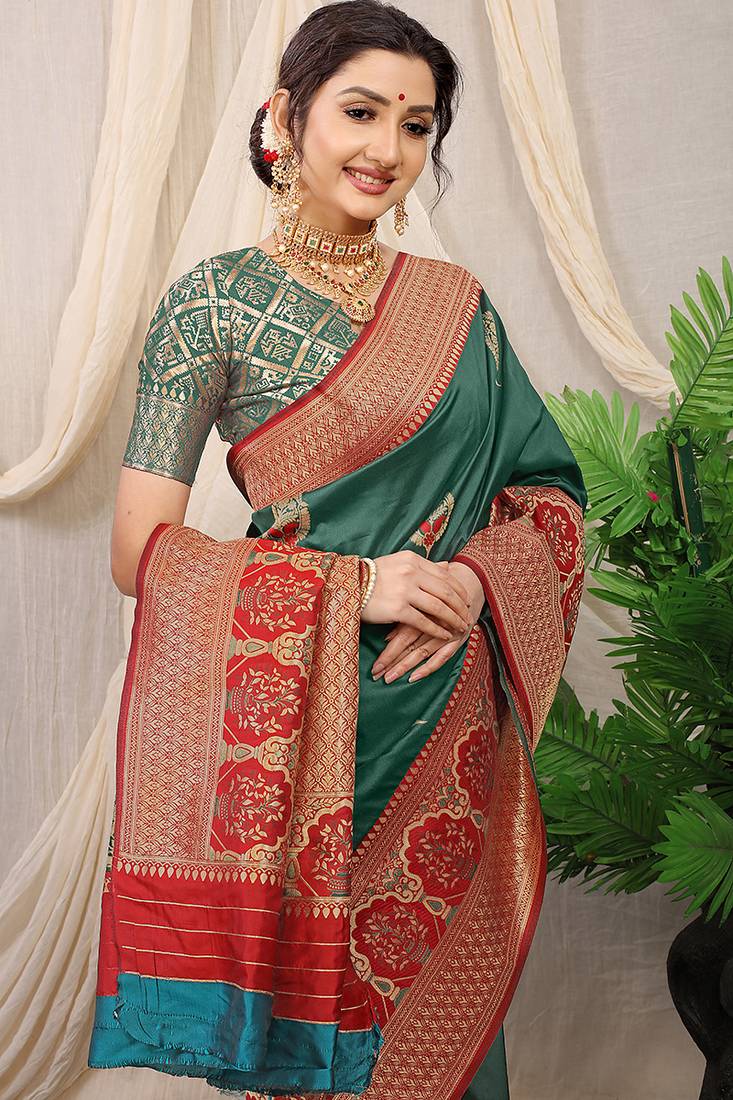 Teal banarasi silk blend saree with red zari border & brocade blouse