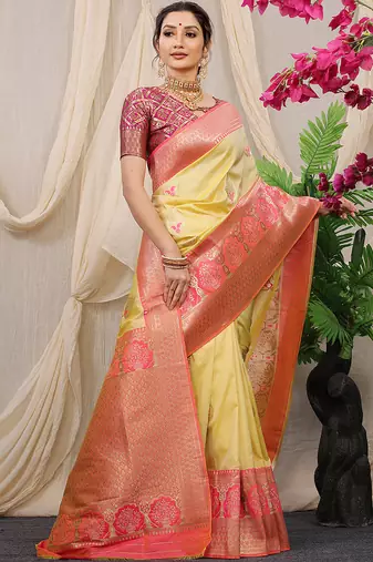 Light yellow banarasi silk blend saree with pink zari border & brocade blouse
