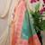 Sea green banarasi silk blend saree with pink zari border & brocade blouse
