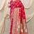 Rani pink banarasi silk blend saree with rich zari woven border