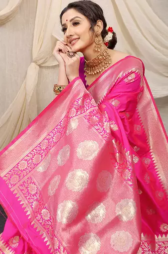 Rani pink banarasi silk blend saree with rich zari woven border