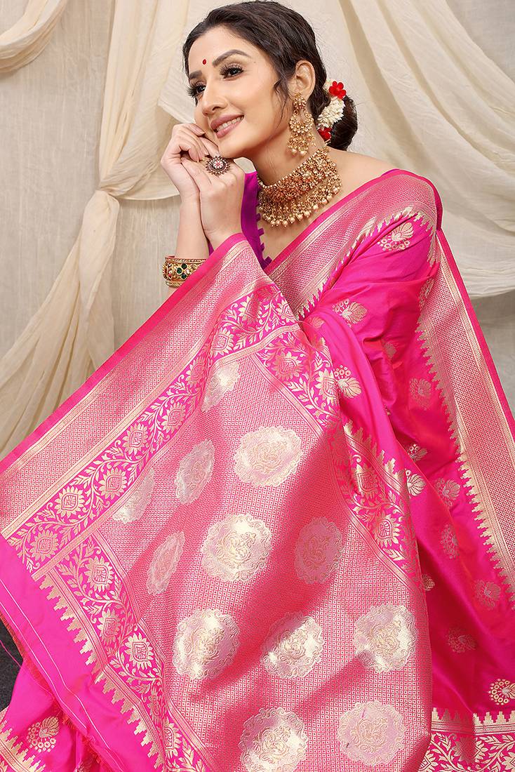 Rani pink banarasi silk blend saree with rich zari woven border