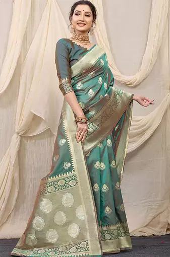 Sea green banarasi silk blend saree with rich zari woven border