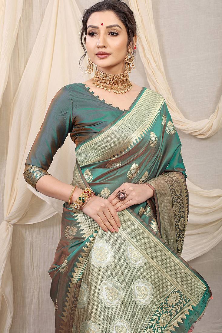 Sea green banarasi silk blend saree with rich zari woven border