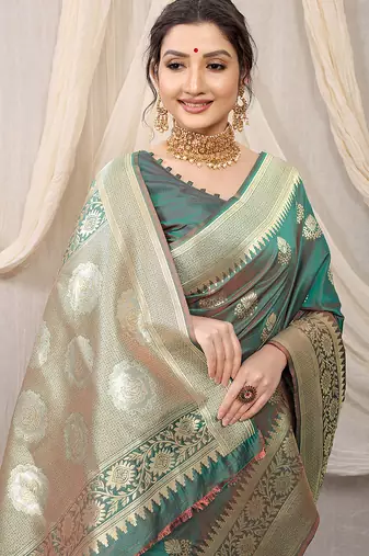Sea green banarasi silk blend saree with rich zari woven border