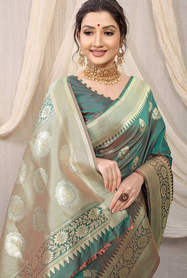 Sea green banarasi silk blend saree with rich zari woven border