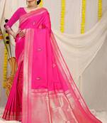 Rani pink banarasi silk blend saree with zari border & woven buti design