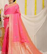 Pink banarasi silk blend saree with zari border & woven buti design