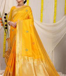 Mustard yellow banarasi silk blend saree with zari border & woven buti design