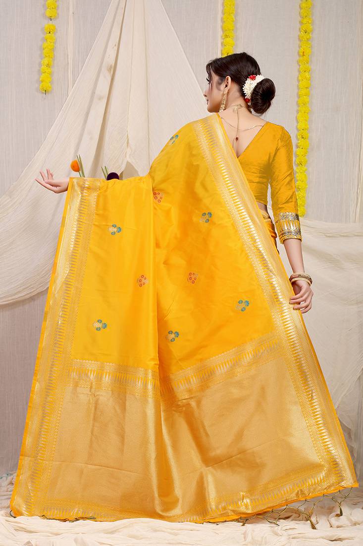 Mustard yellow banarasi silk blend saree with zari border & woven buti design