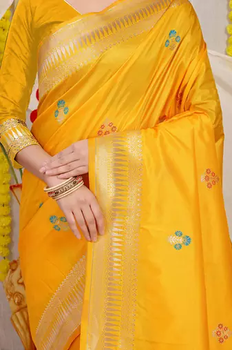 Mustard yellow banarasi silk blend saree with zari border & woven buti design