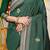 Bottle green banarasi silk blend saree with zari border & woven buti design