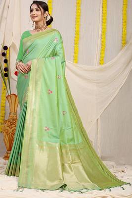 Light green banarasi silk blend saree with zari border & woven buti design 1