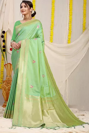 Light green banarasi silk blend saree with zari border & woven buti design