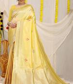 Light yellow banarasi silk blend saree with zari border & woven buti design