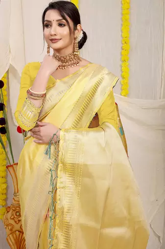 Light yellow banarasi silk blend saree with zari border & woven buti design