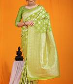 Light green banarasi silk blend saree with rich gold zari weaving & brocade pallu