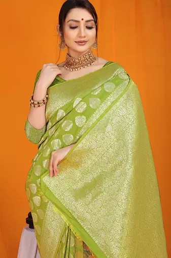 Light green banarasi silk blend saree with rich gold zari weaving & brocade pallu