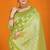 Light green banarasi silk blend saree with rich gold zari weaving & brocade pallu