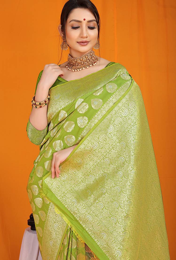 Light green banarasi silk blend saree with rich gold zari weaving & brocade pallu