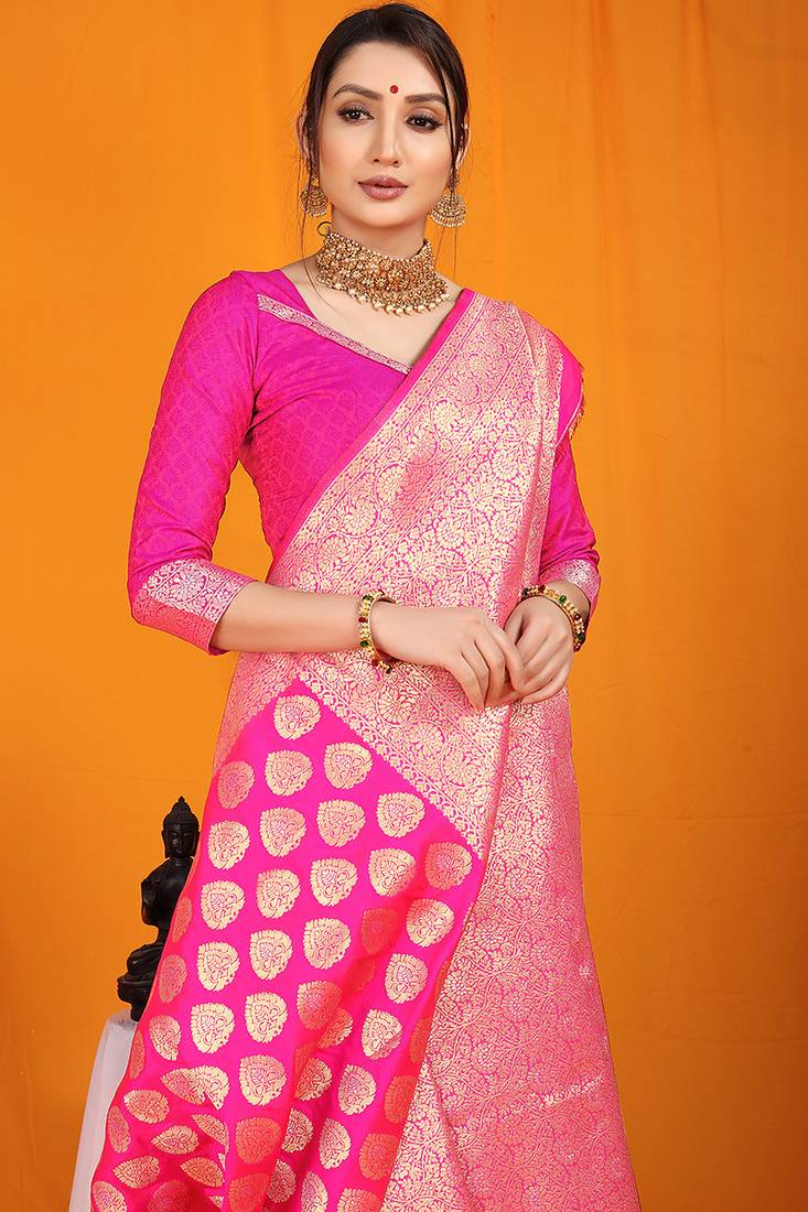 Rani pink banarasi silk blend saree with rich gold zari weaving & brocade pallu
