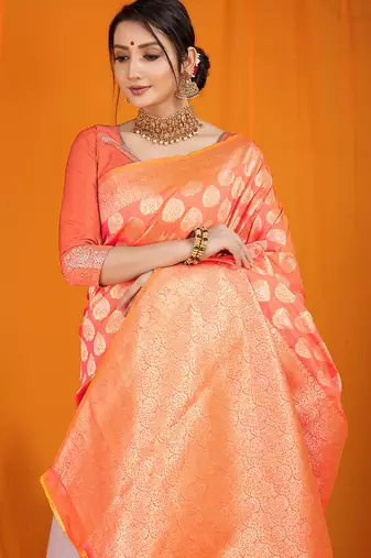 Peach banarasi silk blend saree with rich gold zari weaving & brocade pallu
