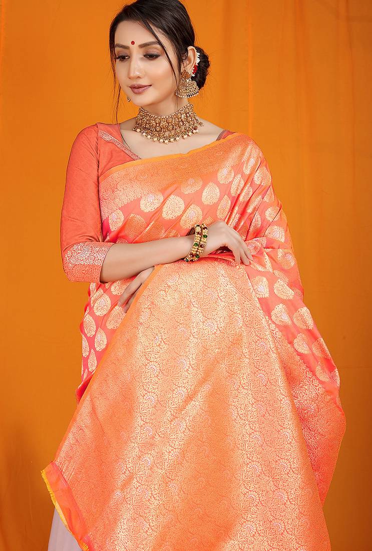 Peach banarasi silk blend saree with rich gold zari weaving & brocade pallu
