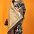 Black banarasi silk blend saree with zari floral weaving & rich pallu