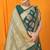 Bottle green banarasi silk blend saree with zari floral weaving & rich pallu
