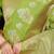 Lime green banarasi silk blend saree with zari floral weaving & rich pallu