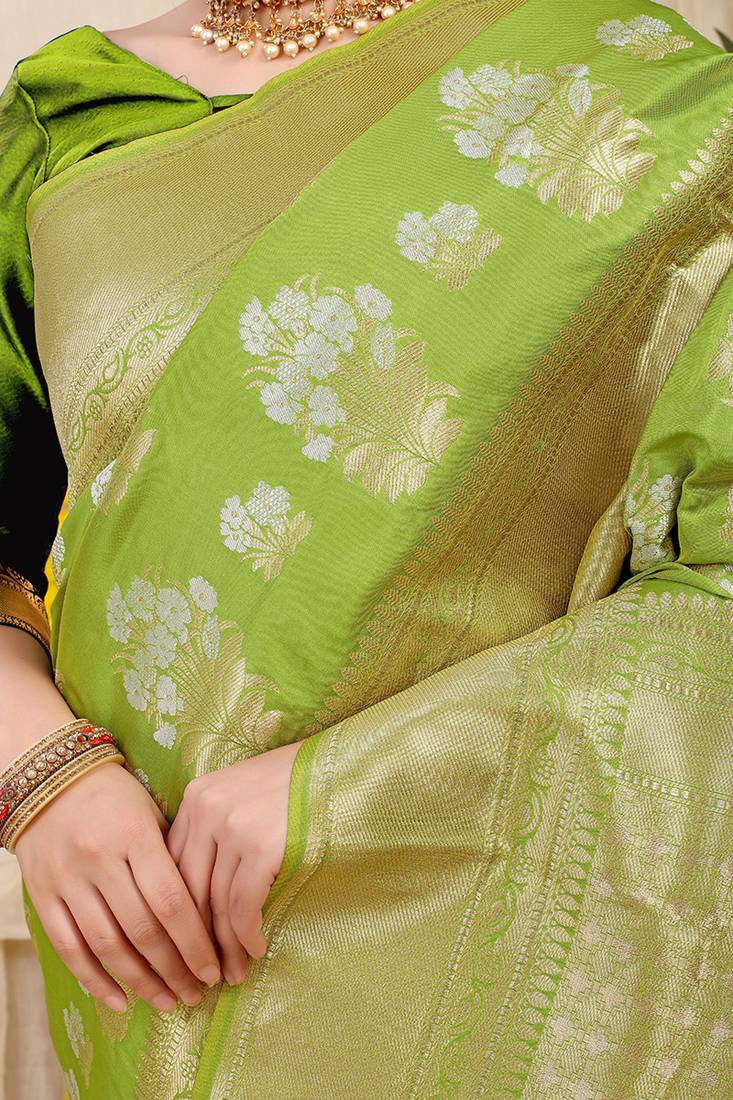 Lime green banarasi silk blend saree with zari floral weaving & rich pallu