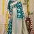 Teal banarasi silk blend saree with zari floral weaving & rich pallu