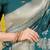 Teal banarasi silk blend saree with zari floral weaving & rich pallu