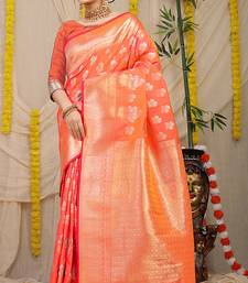 Peach orange banarasi silk blend saree with zari floral weaving & rich pallu