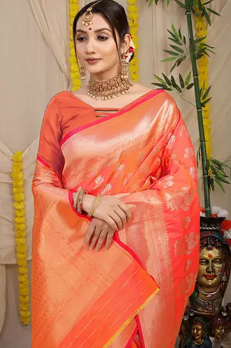 Peach orange banarasi silk blend saree with zari floral weaving & rich pallu