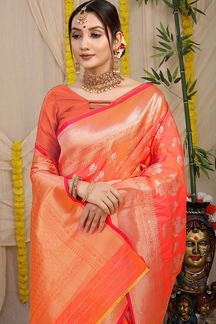 Peach orange banarasi silk blend saree with zari floral weaving & rich pallu