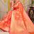 Peach orange banarasi silk blend saree with zari floral weaving & rich pallu