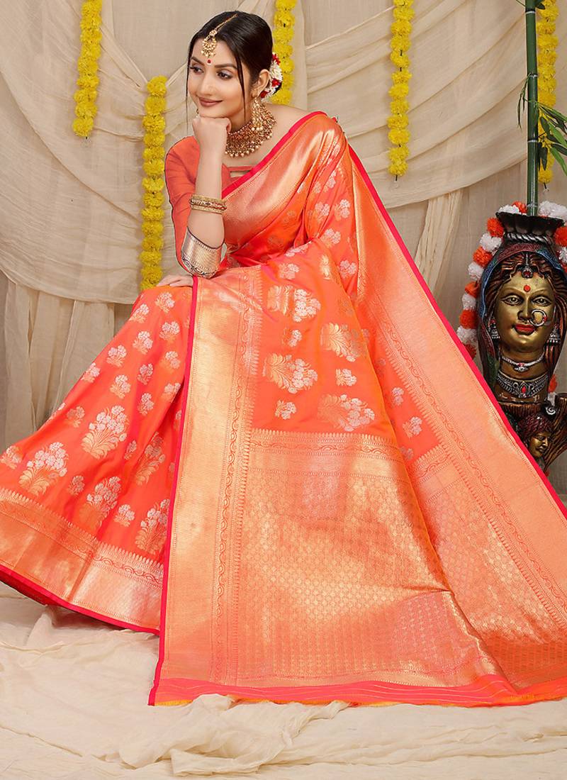 Peach orange banarasi silk blend saree with zari floral weaving & rich pallu