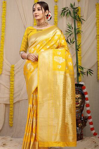 Yellow banarasi silk blend saree with zari floral weaving & rich pallu