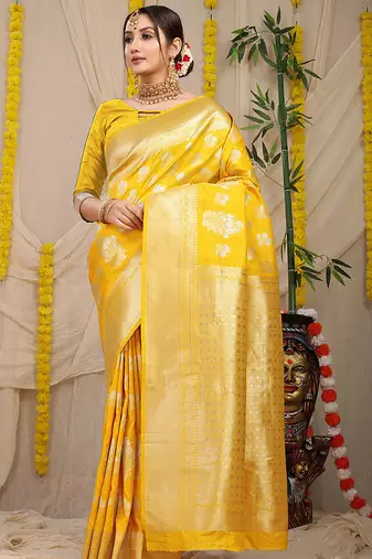 Yellow banarasi silk blend saree with zari floral weaving & rich pallu