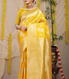 Yellow banarasi silk blend saree with zari floral weaving & rich pallu