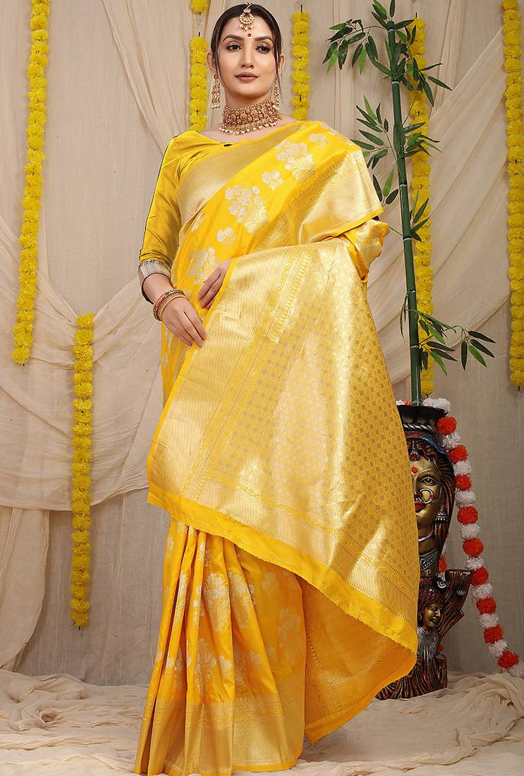 Yellow banarasi silk blend saree with zari floral weaving & rich pallu